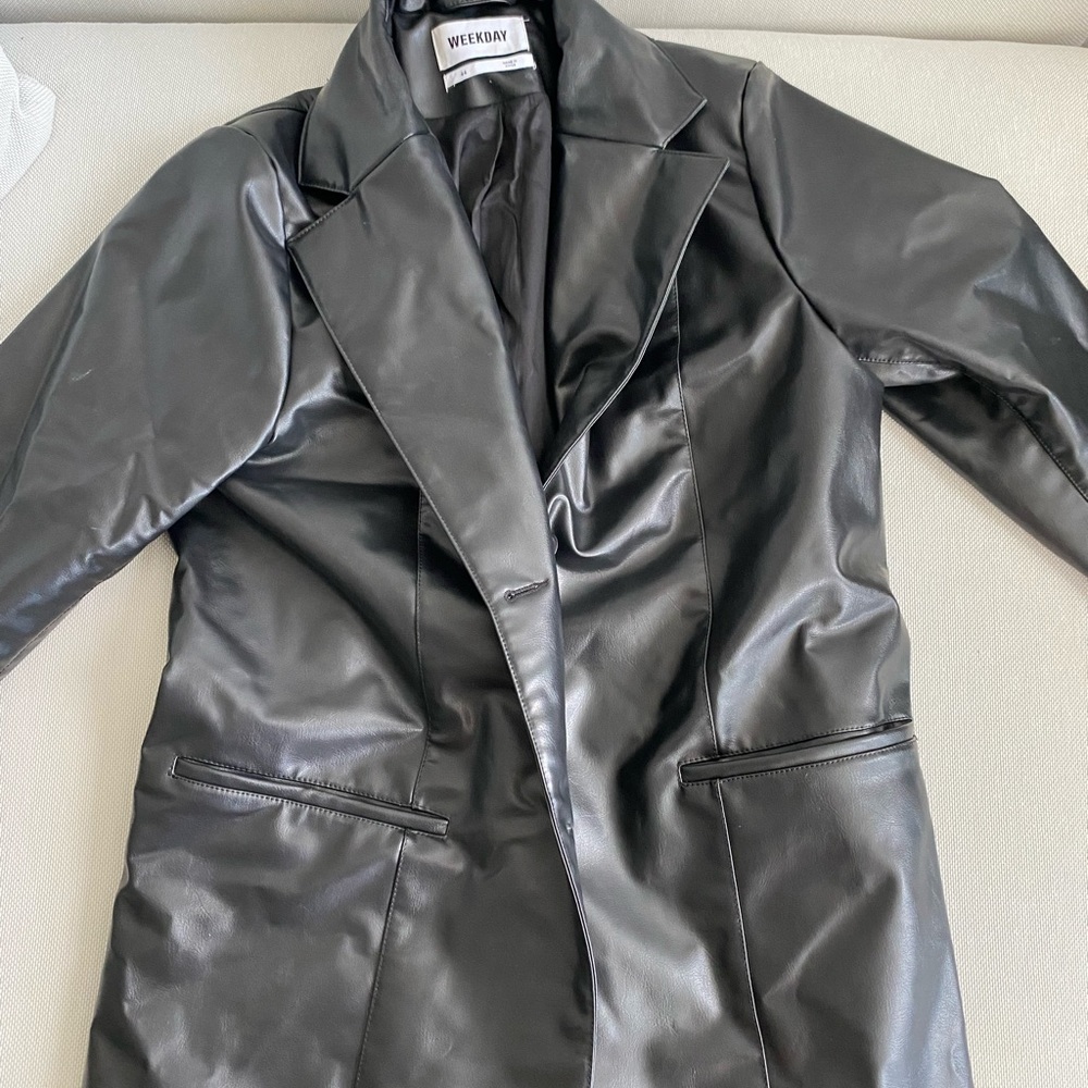 Faux leather blazer.